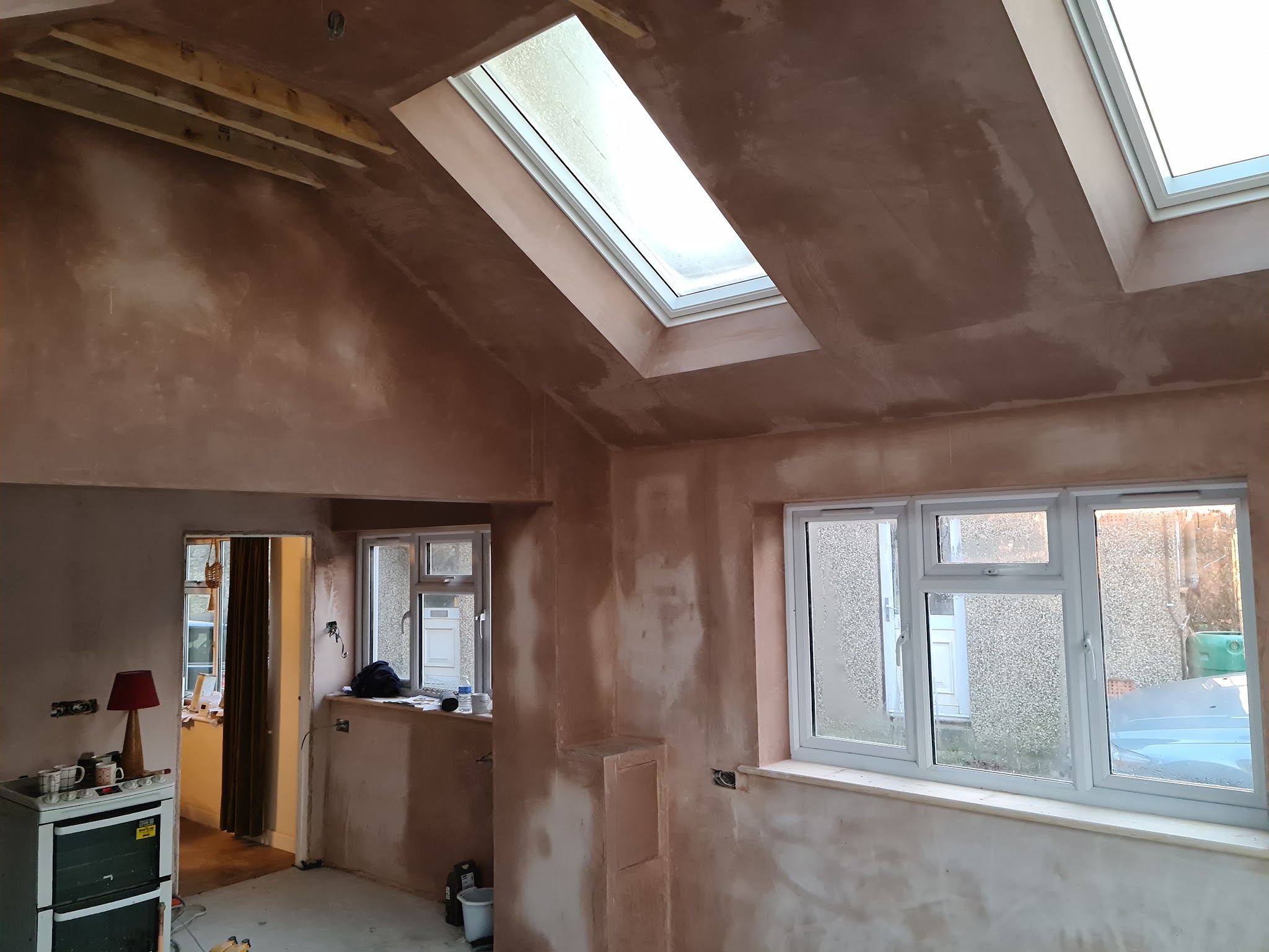 Freshly plastered room with two roof windows